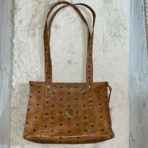 Authentic MCM shoulder bag preowned. Tan color
